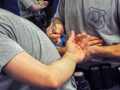 recruit being handcuffed